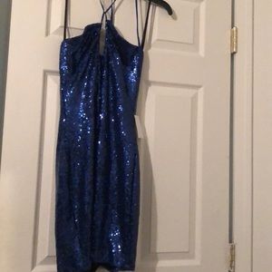 Turn heads with this brand NEW Royal Blue sequined dress!